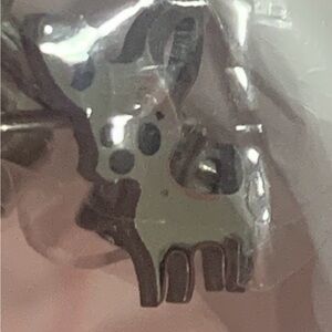 Small animal (dog?) earrings